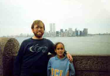 Tom and Carolina Rue, October 1, 1989, on the shore of Liberty Island with the New York skyline in the background. Photo by a random tourist.