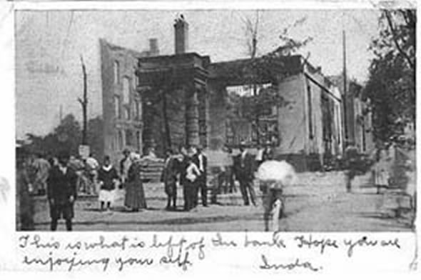 Postcard showing fire damage with a contemporary note by a local resident