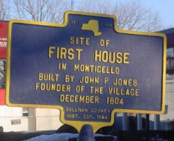 Historical marker, first house in Monticello, current site of the Bank of New York across the street from the Lawrence H. Cooke Sullivan County Court House. Photo by Tom Rue.